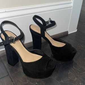 Black platform heels. Comfortable to walk in